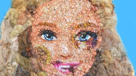 La Barbie tumefatta, opera-simbolo della Triennale dell'Arte contemporanea che si inaugura oggi in fiera