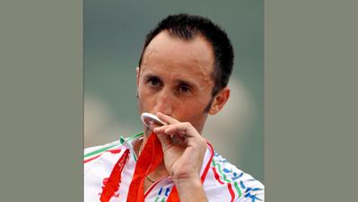 Rebellin con l'argento vinto nel 2008 a Beijing e che poi gli venne tolta